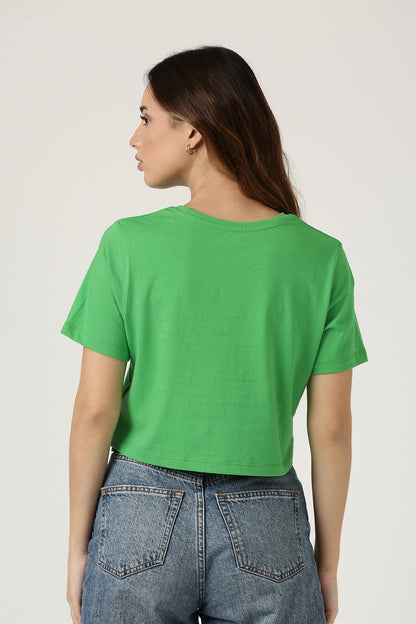 Green T-shirt with caption